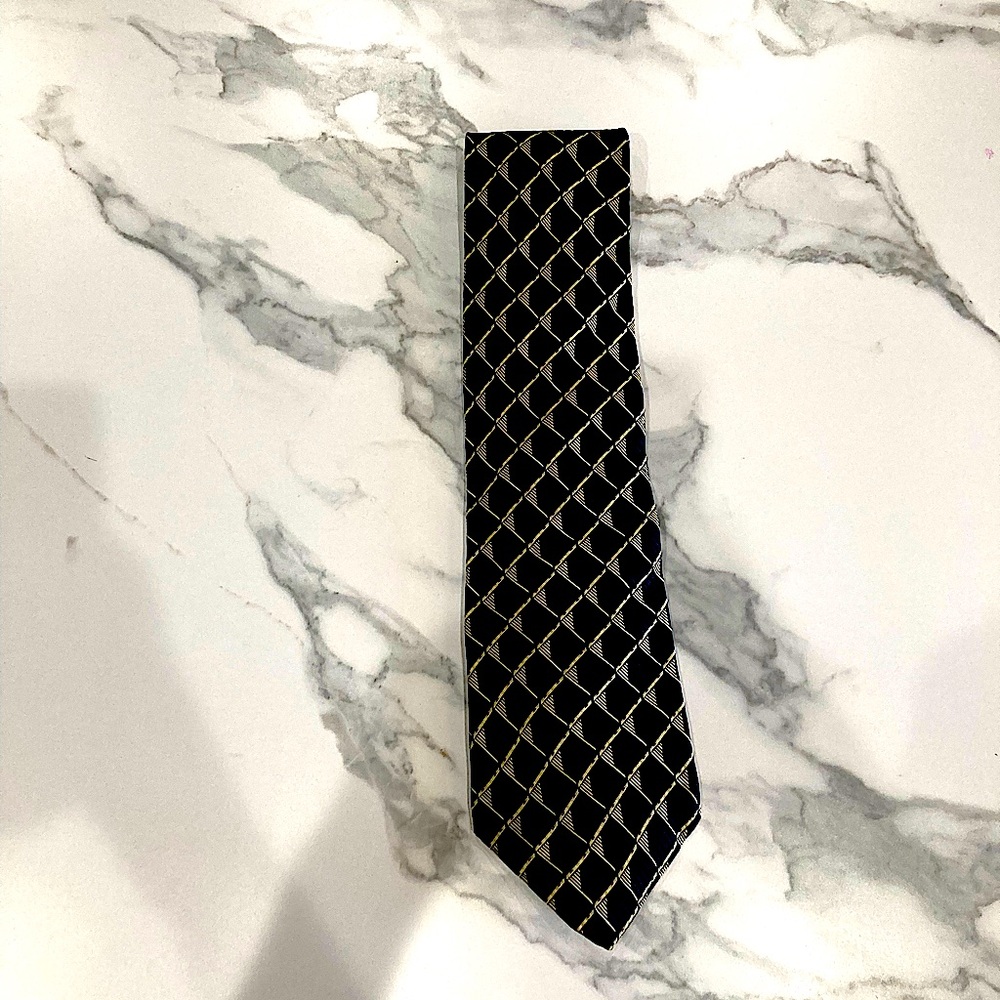 A Fantastic tie the brand is Van heusen 55 1/2 inches.
